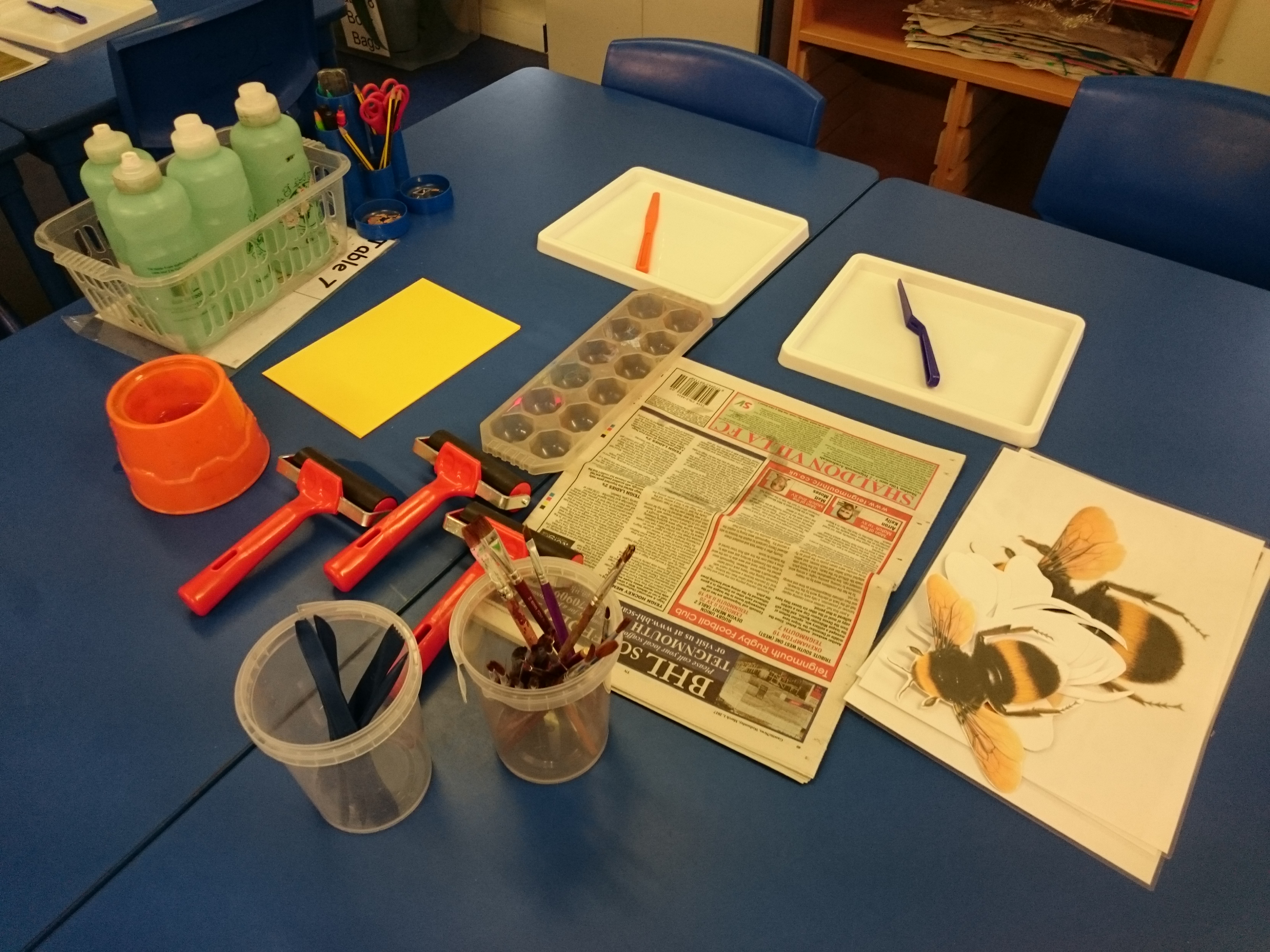 Art materials ready for children's artwork based on natural habitats.