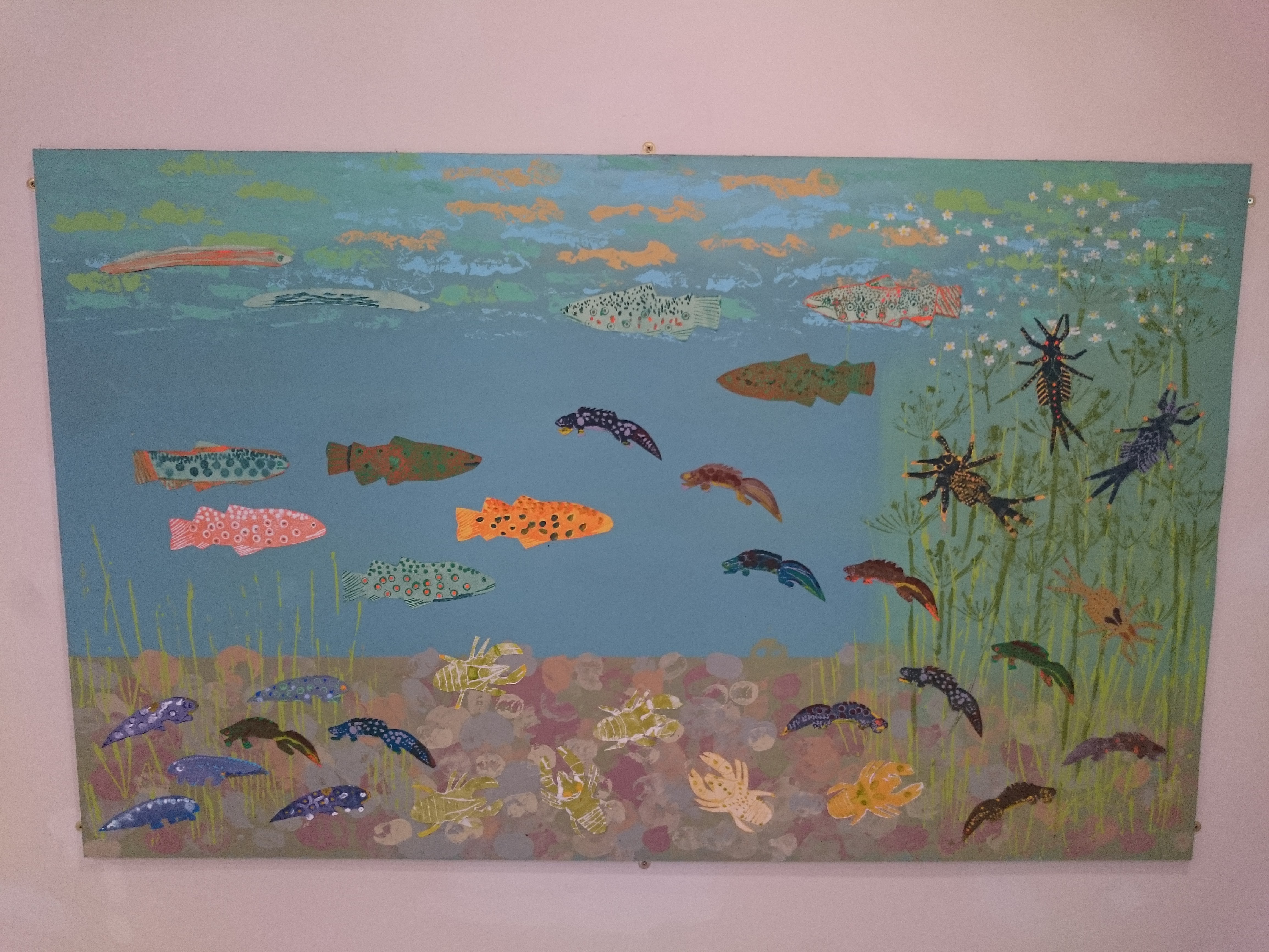 Colourful collage artwork created by children. Inspired by river habitat