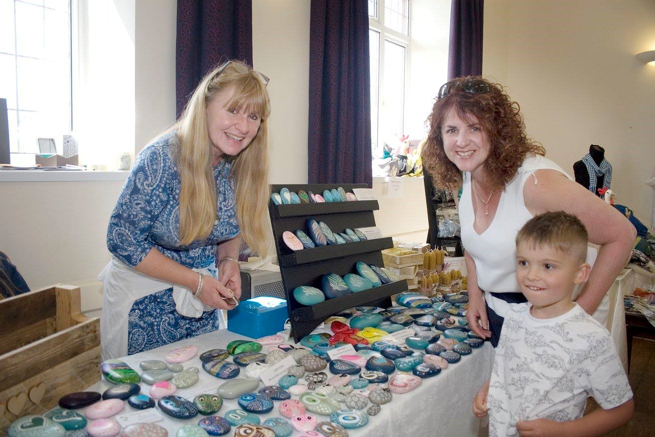 painted stone stall at Blackdown Hills Food and Craft Fayre