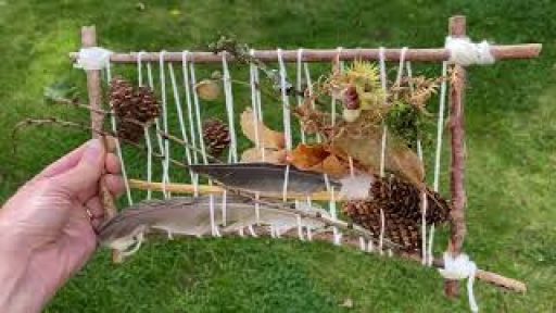 Nature Loom with pine cones and feathers