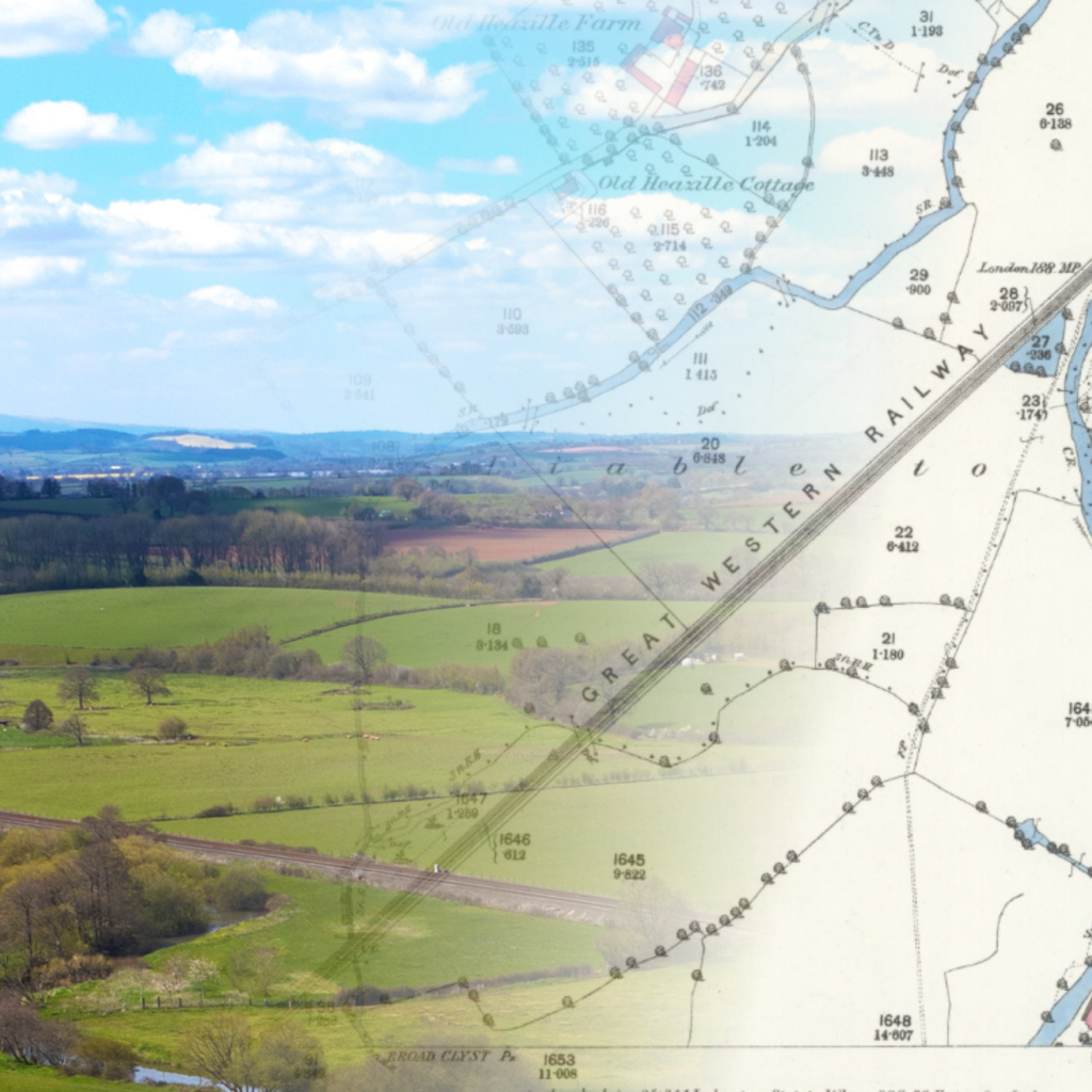 An old map overlaid with a modern photograph of a landscape.