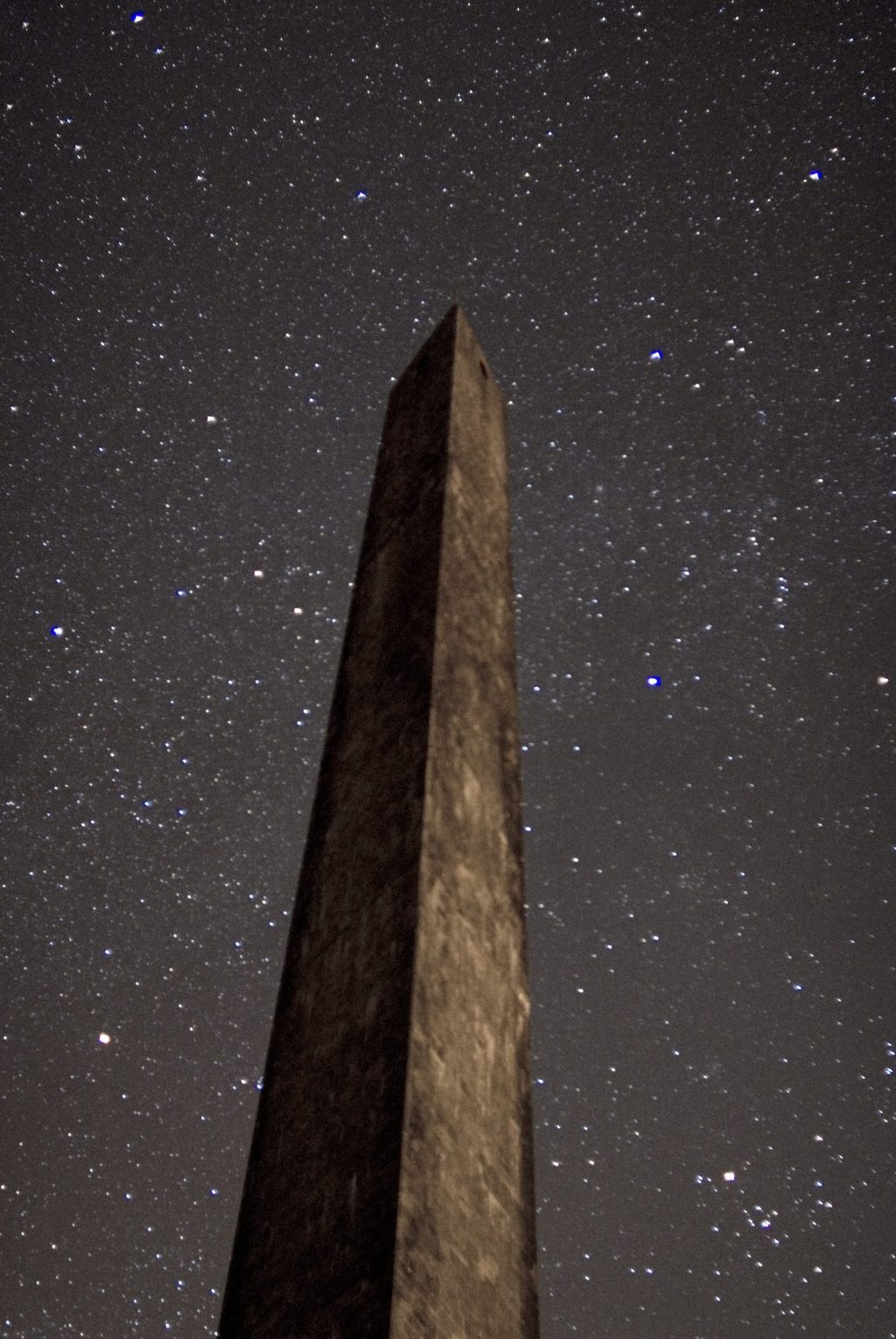 Wellington Monument at night with a star filled night sky