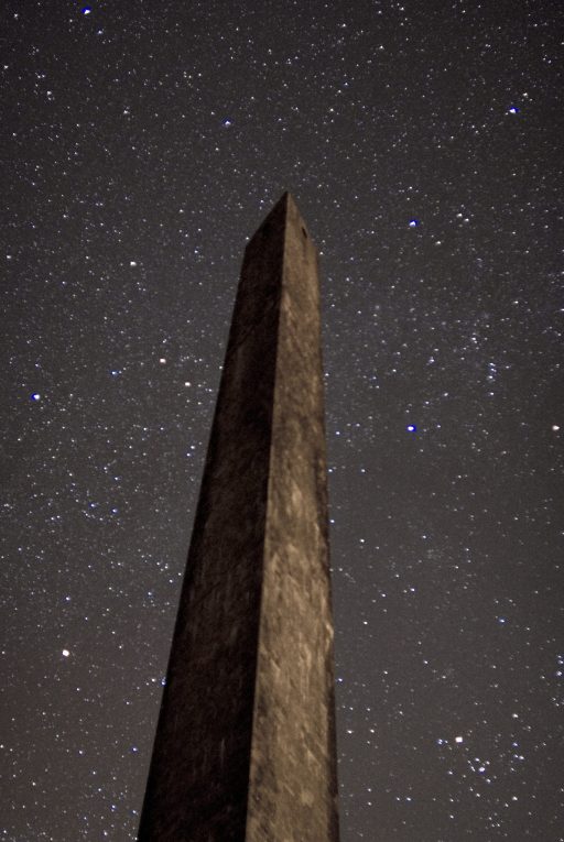 Wellington Monument at night with a star filled night sky